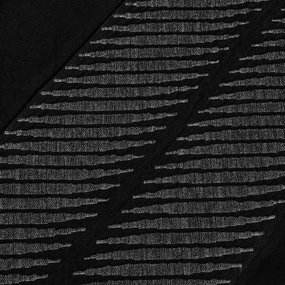 Edgy Black Spliced Top with 3D Jacquard Design